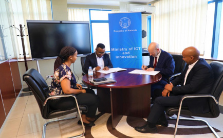 siging and agreement with the Rwandan ministry of ICT